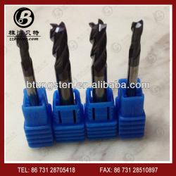 Solid tungsten carbide end mills cutting