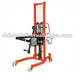 Tilting barrel fork lift