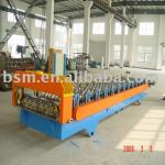 Deck floor panel roll forming machine