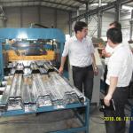 Hydraulic control steel structure building material floorboard making machinery