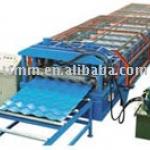 Roof tile forming machine