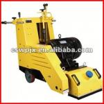 Self propelled concrete grooving machine