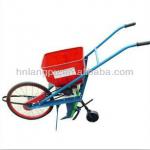 Manual corn seeder/planter