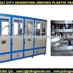 Plastic closure making machine